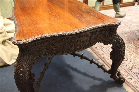A 19th century Burmese hardwood centre or library table, W.5ft 10in. D.3ft 8in. H.2ft 6in.